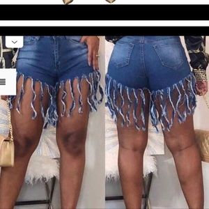 Frayed dark blue denim shorts